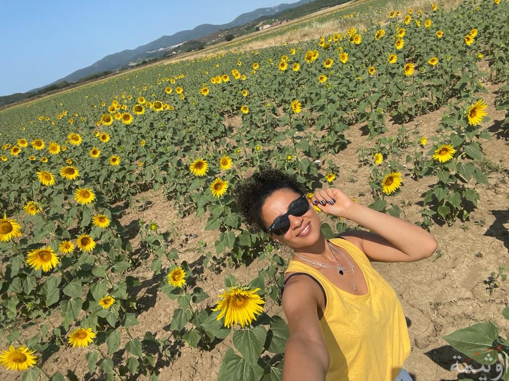 me in yellow in a sun flower field
